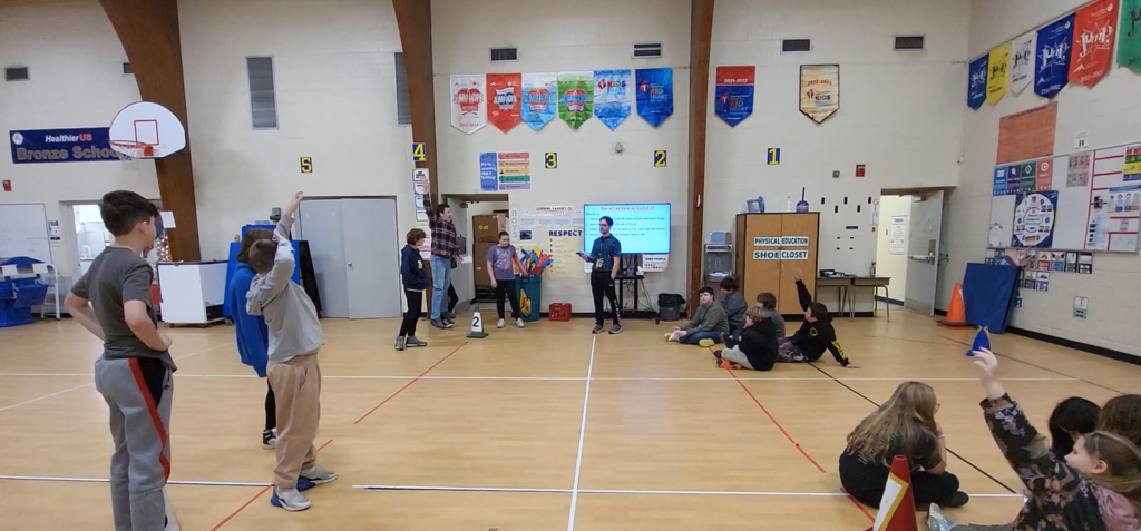students learning about hockey in Physical Education class!