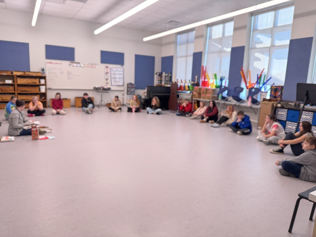 A picture of students in class at the new school. 