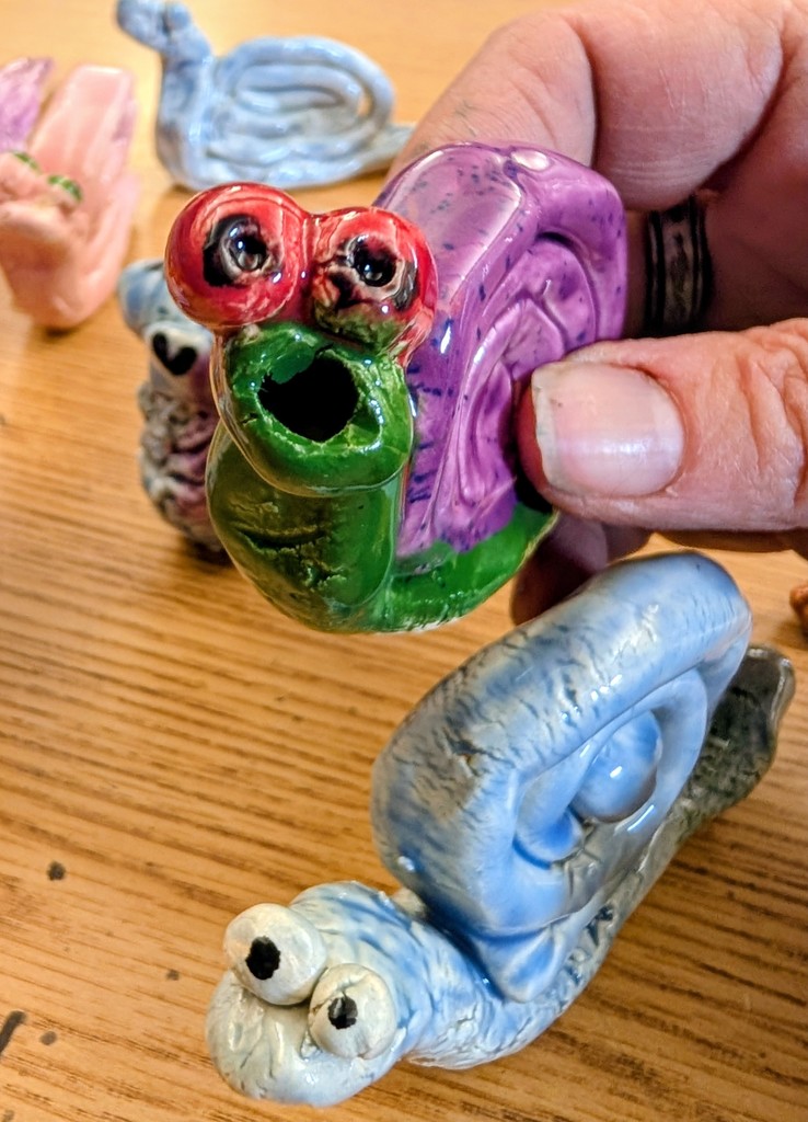 pictures of ceramic snails made in art class.