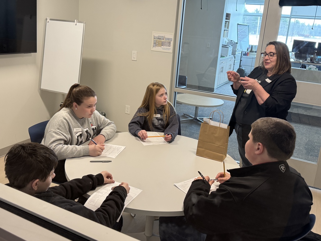 Pictures of student in breakout sessions.