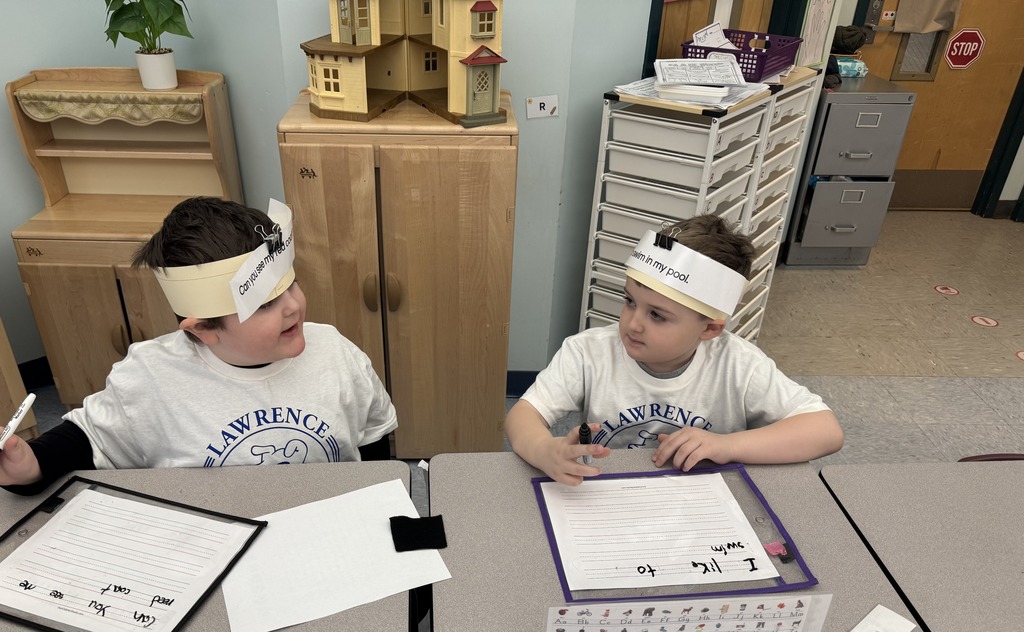 Picture of students learning with playing games.