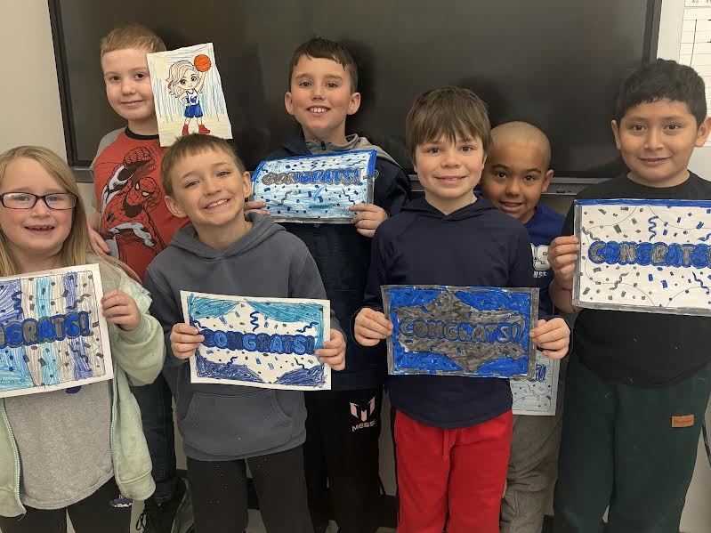 Pictures of students visiting the girls high school basketball team and celebrating their victory. 