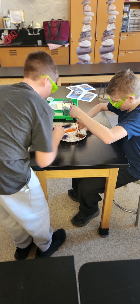 8th graders explore tectonic plate movements using graham crackers, marshmallows, and chocolate