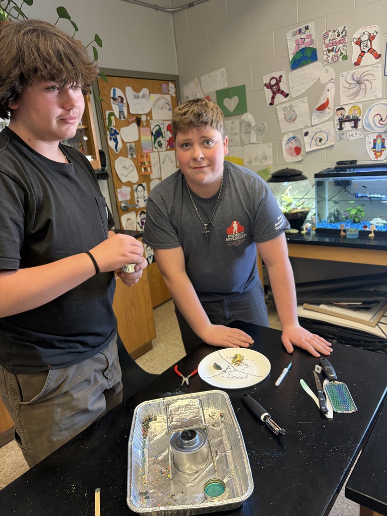 8th graders explore tectonic plate movements using graham crackers, marshmallows, and chocolate