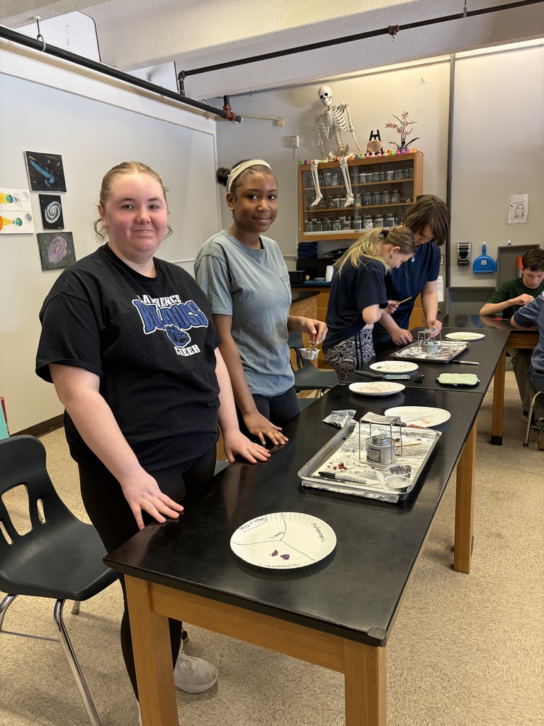 8th graders explore tectonic plate movements using graham crackers, marshmallows, and chocolate