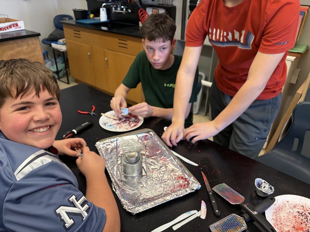 8th graders explore tectonic plate movements using graham crackers, marshmallows, and chocolate
