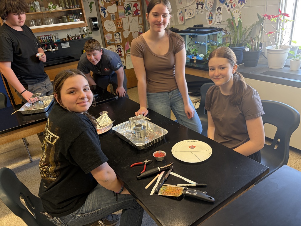 8th graders explore tectonic plate movements using graham crackers, marshmallows, and chocolate