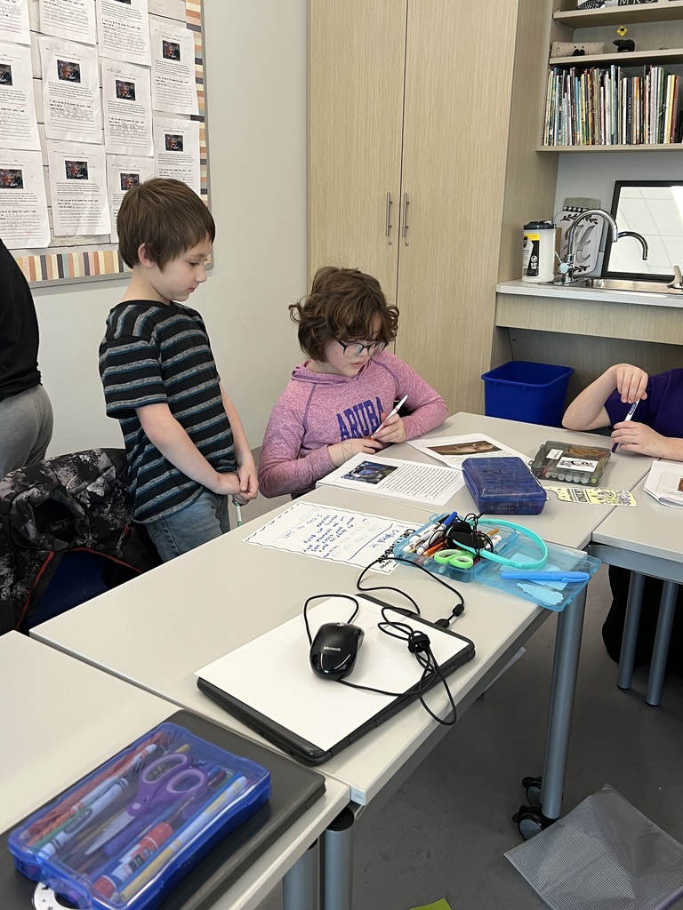 Students working on writing assignments