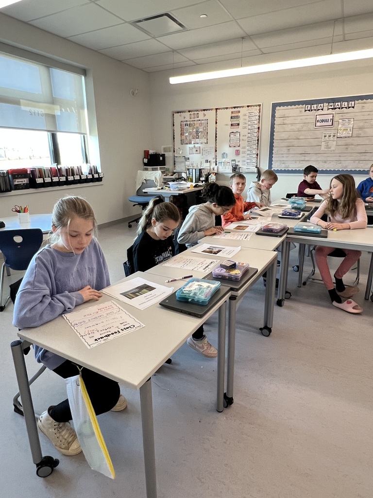 Students working on writing assignments