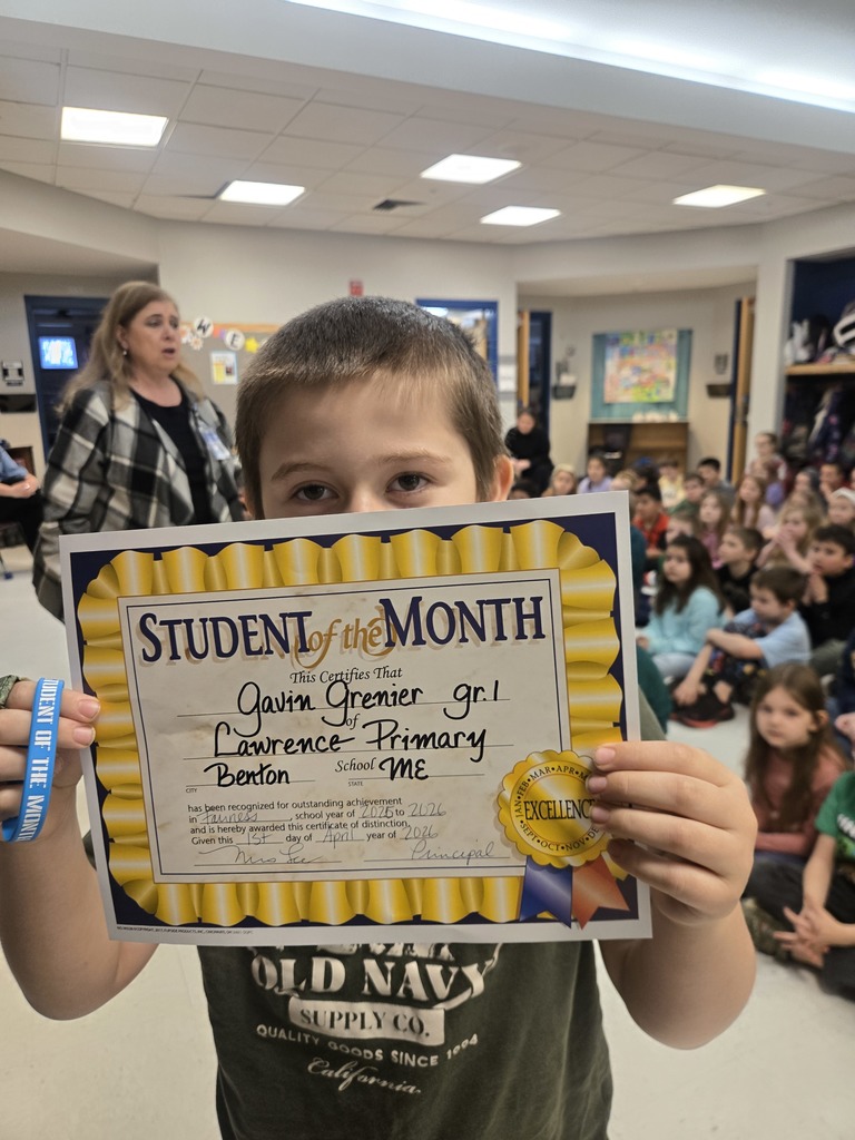 Students being celebrated for being the students of the month.