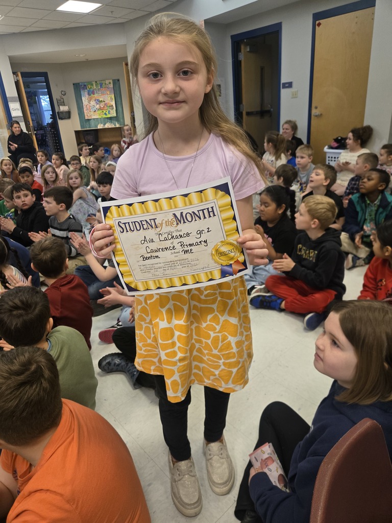 Students being celebrated for being the students of the month.