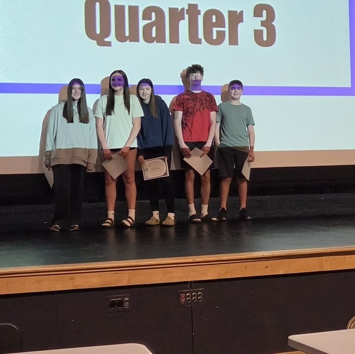 Students being celebrated for being the students of the month.