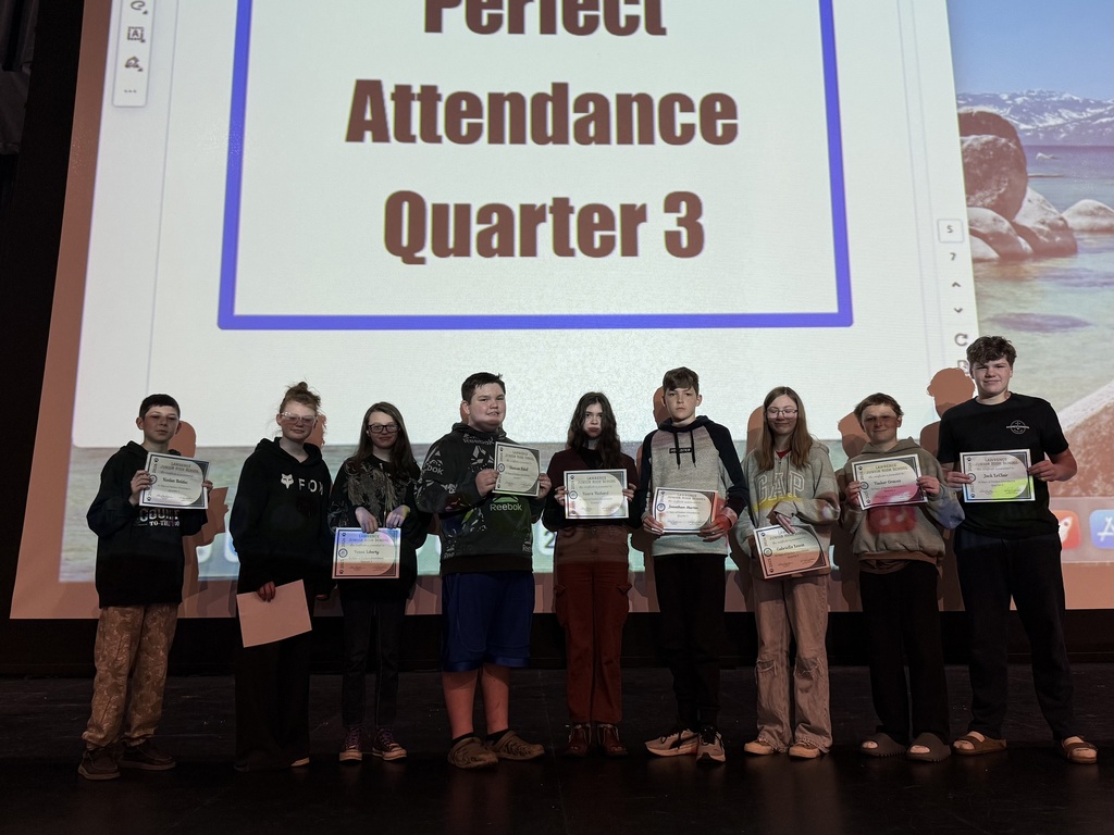 Students being celebrated for being the students of the month.