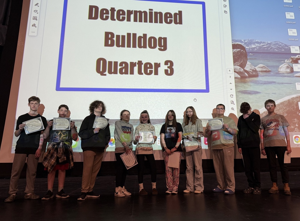 Students being celebrated for being the students of the month.