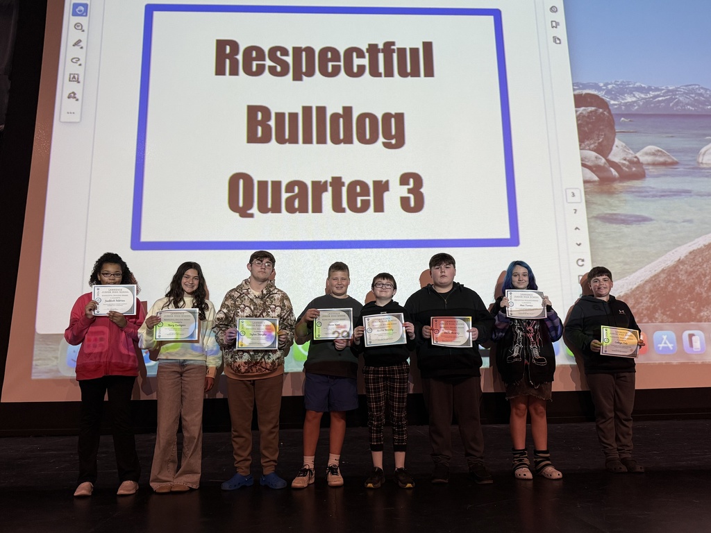 Students being celebrated for being the students of the month.