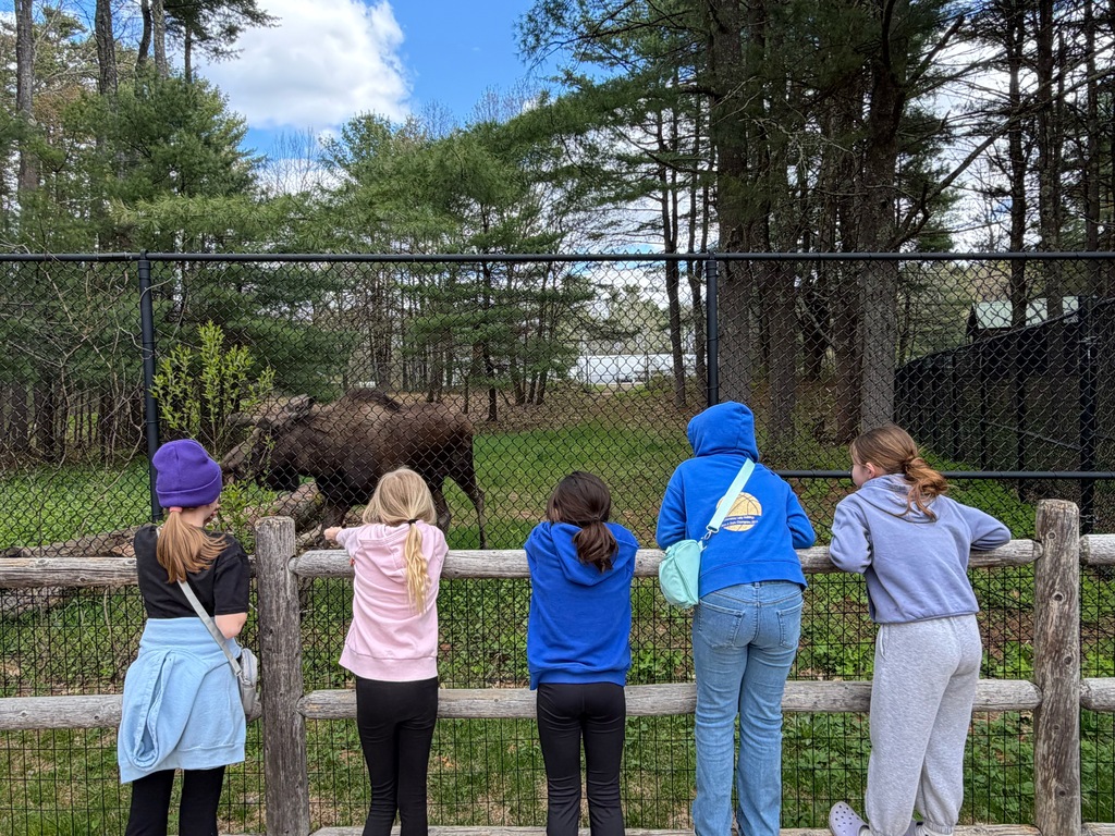 students posing for a picture at the Maine Wildlife park