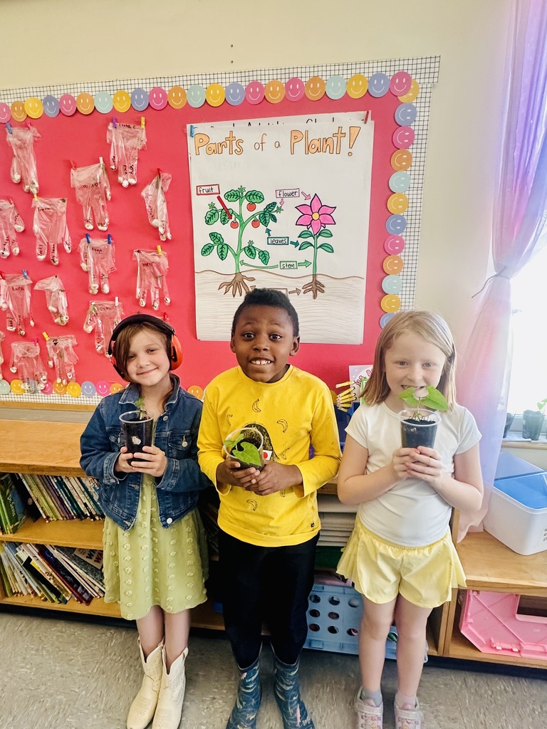 pictures of students holding the plants they grew