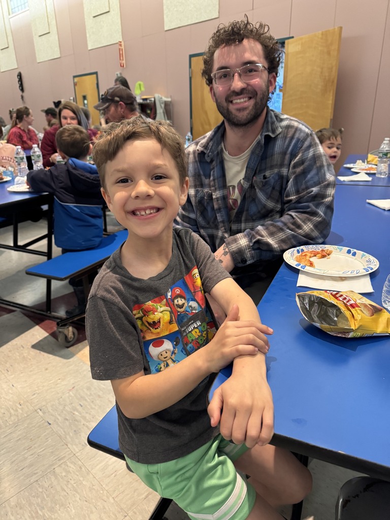 Pictures of students and family from literacy night.