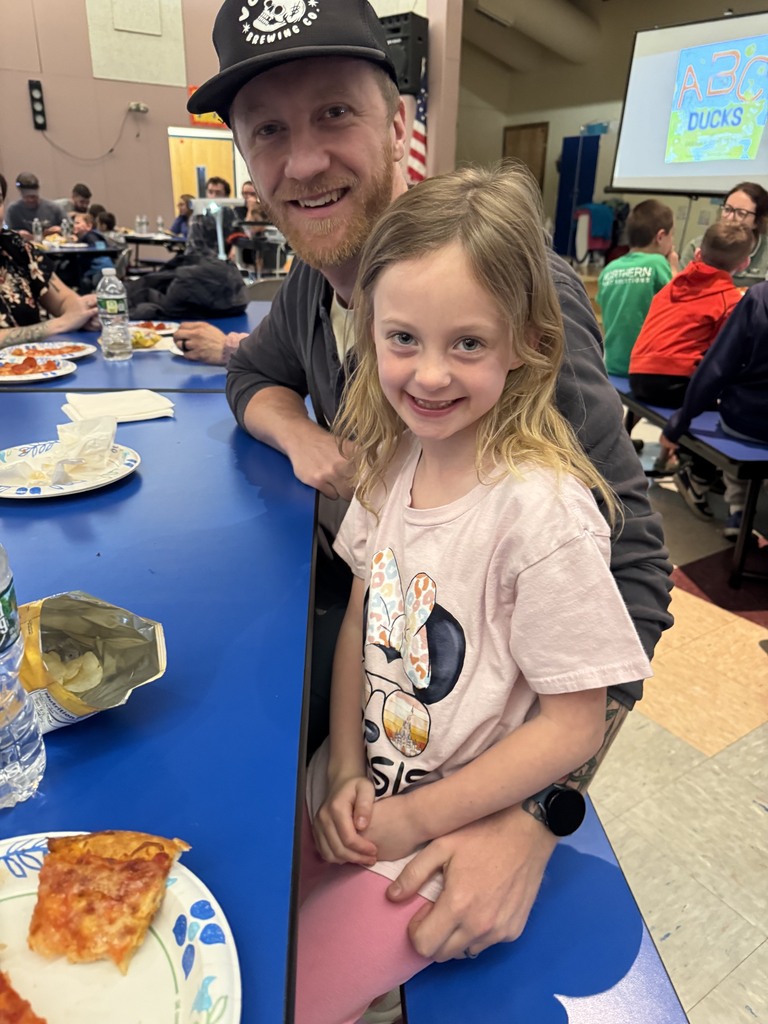 Pictures of students and family from literacy night.