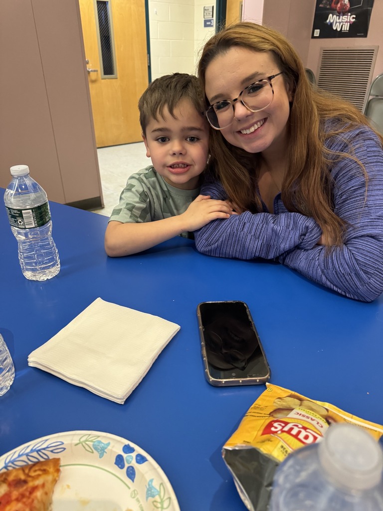 Pictures of students and family from literacy night.