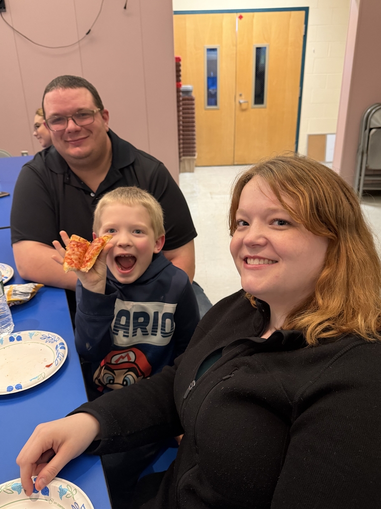 Pictures of students and family from literacy night.