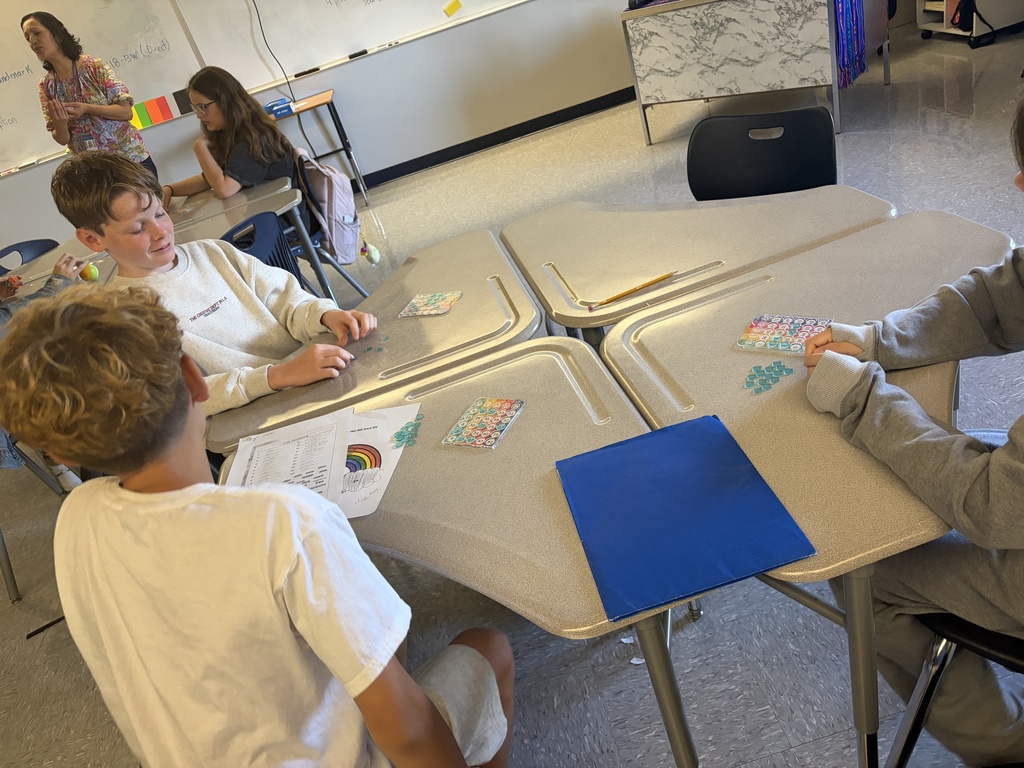 Students learn colors and numbers in Spanish Class by playing bingo.
