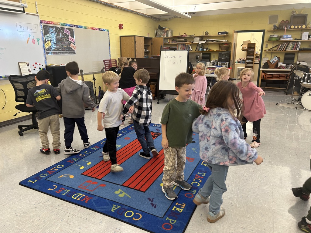 Students learn how to "Sashai" in music class.