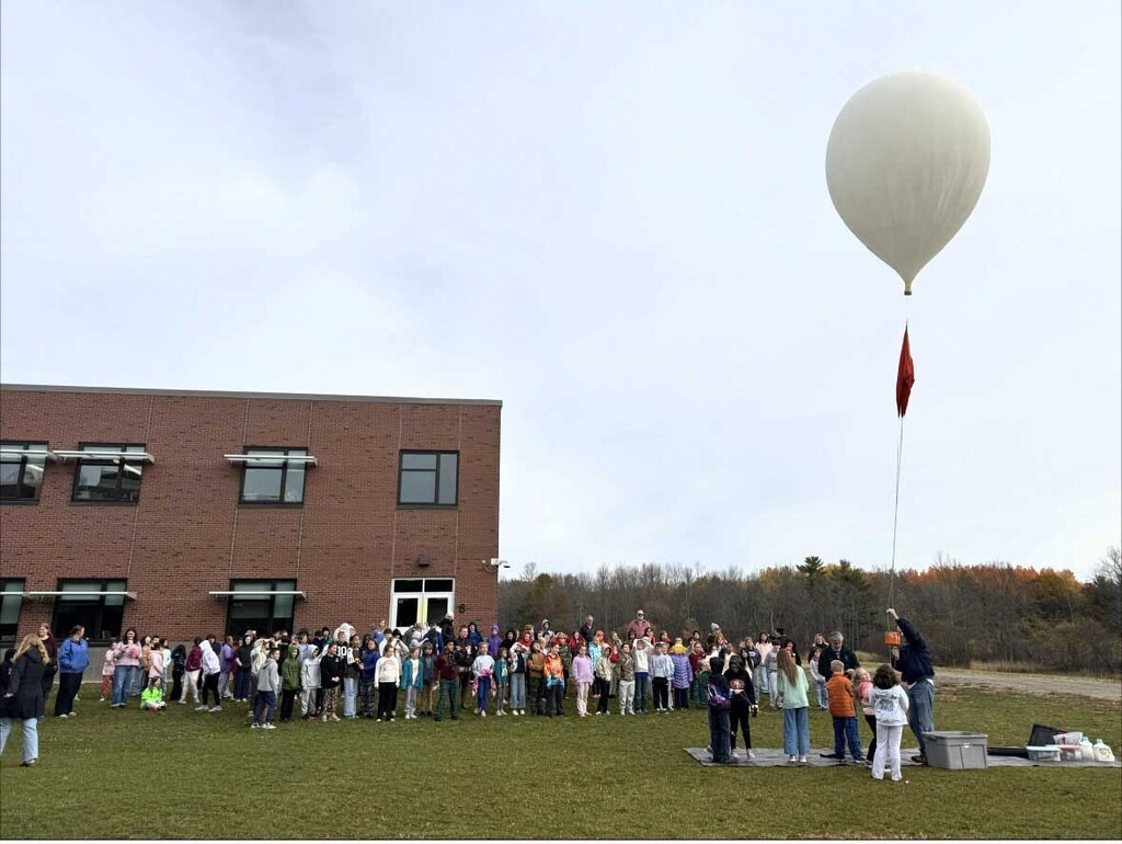 A weather ballon lifts off toward it's apex at 90,000 feet.