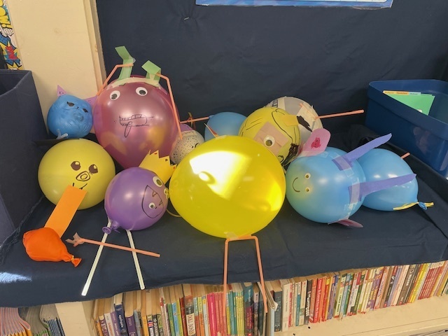 students working on balloon projects.