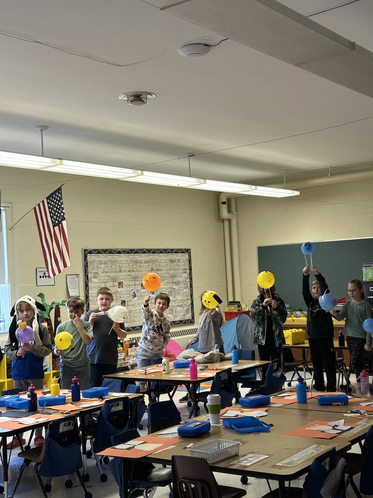 students working on balloon projects.