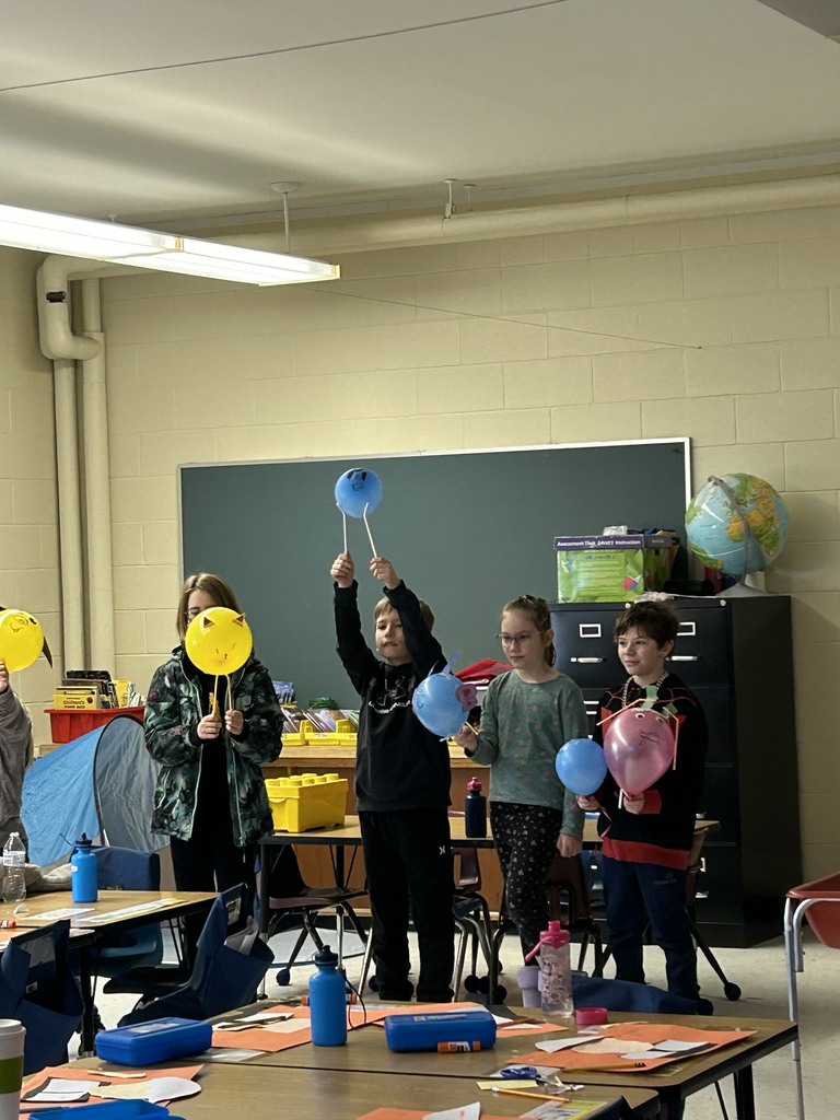 students working on balloon projects.