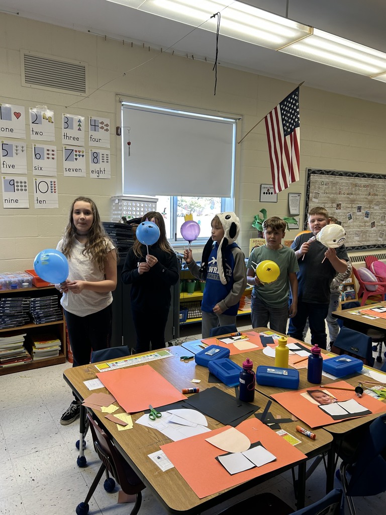 students working on balloon projects.