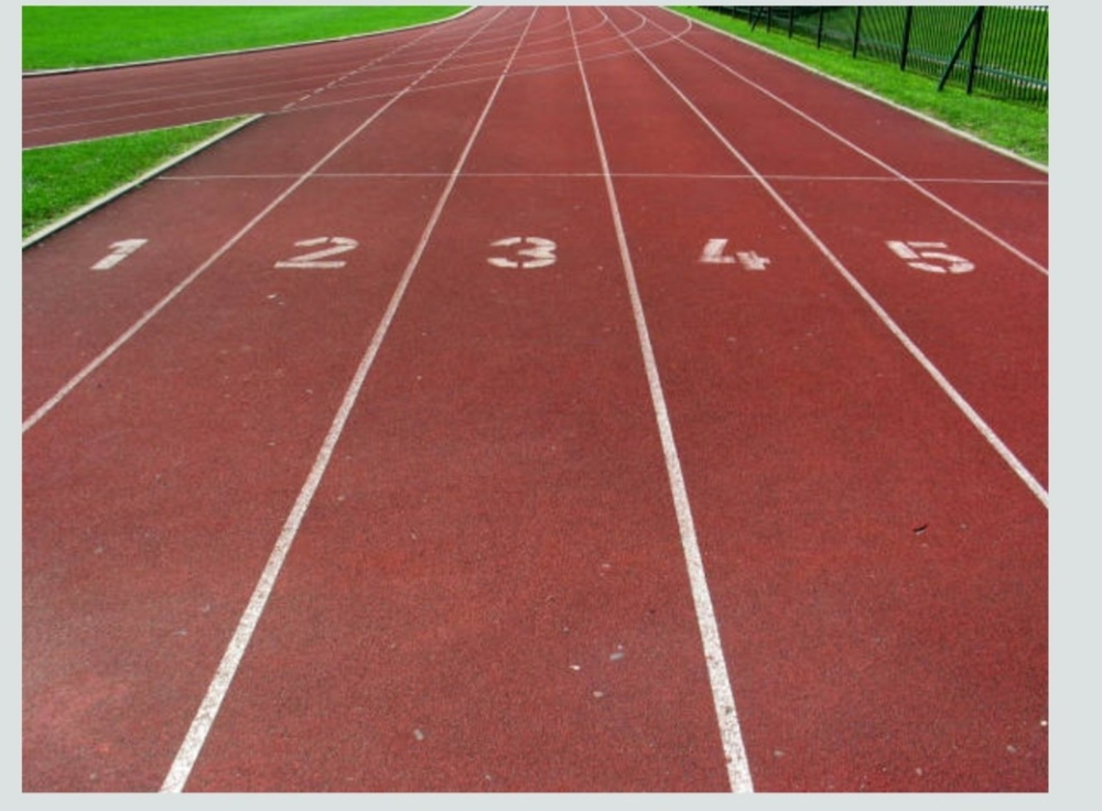 A photo of an empty track with numbers 1 - 5
