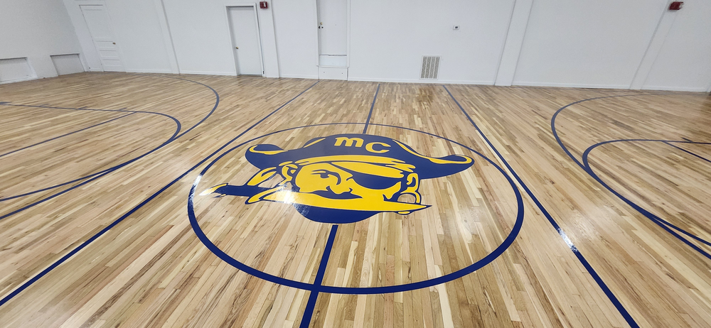 Newly sanded and painted small gymnasium