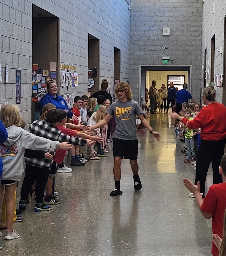 Students lined the hall to cheer Carter on before he heads to State