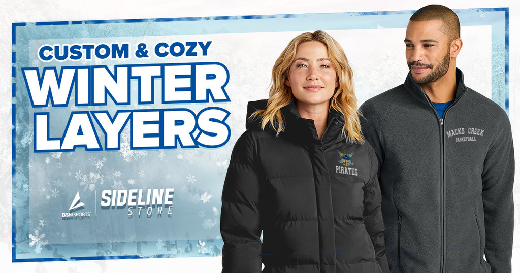 Photo of a man and woman wearing Jackets with Macks Creek logos