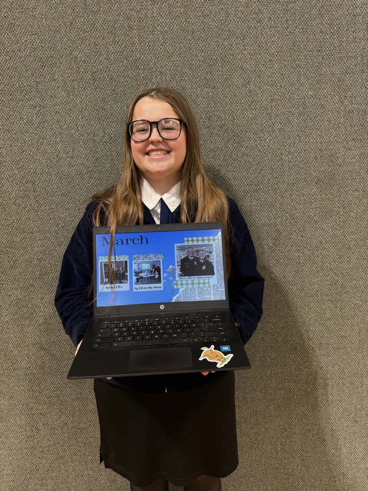 Ella Marshall with her award winning scrapbook