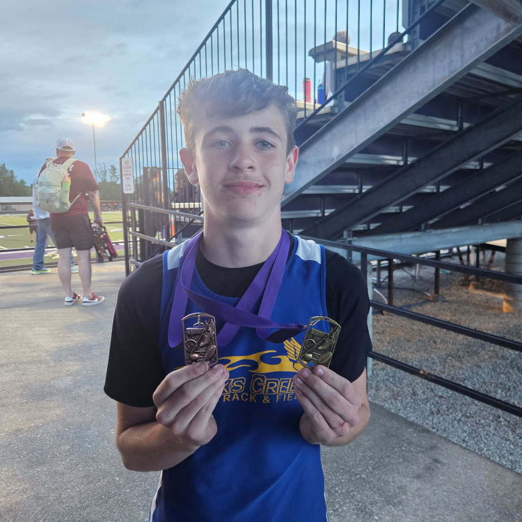 Chase shows his medals