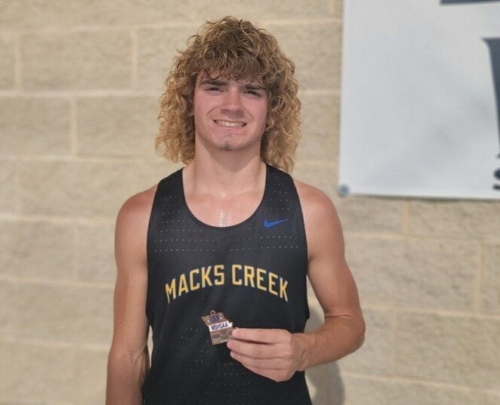 Carter poses with his Sectional medal