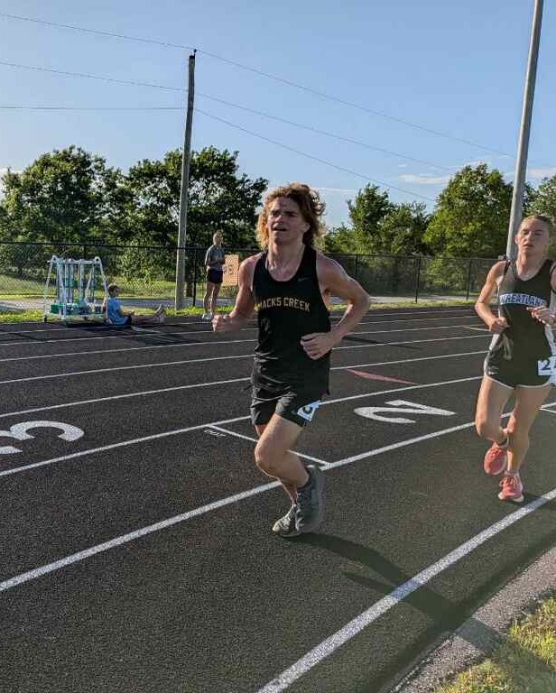Carter Ferrell is seen here running on a track at a meet earlier this season.
