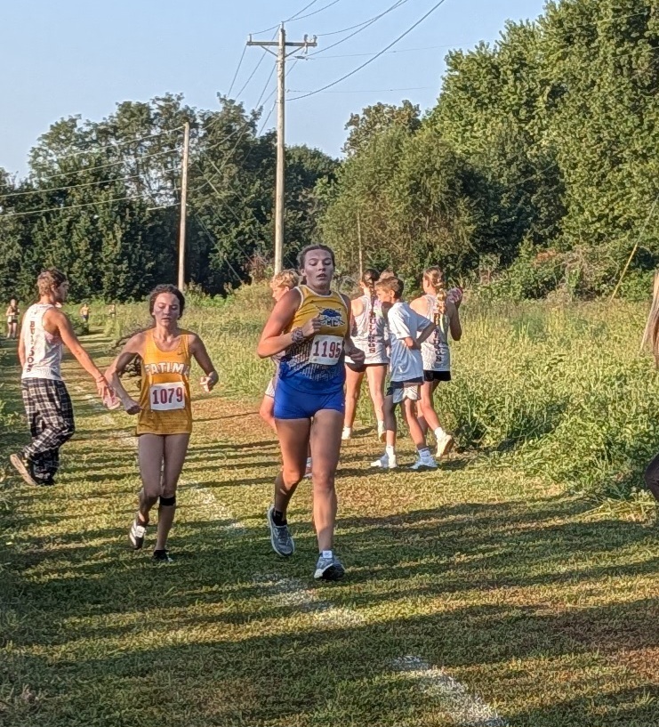 Despite the heat, Senior Bailey set a PR this morning!