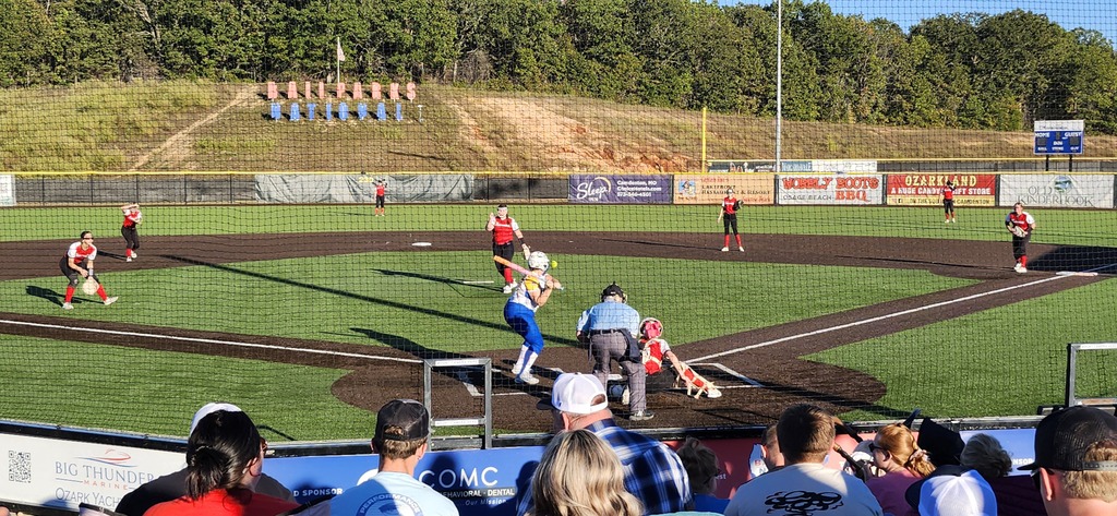 Ella Marshall is at bat. 