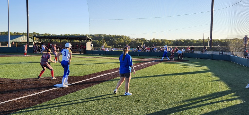 Peyton on 3rd base, just before Ella hits her home. 