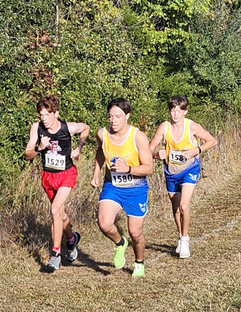 Sebastian and Fisher climb the longest hill of the race.