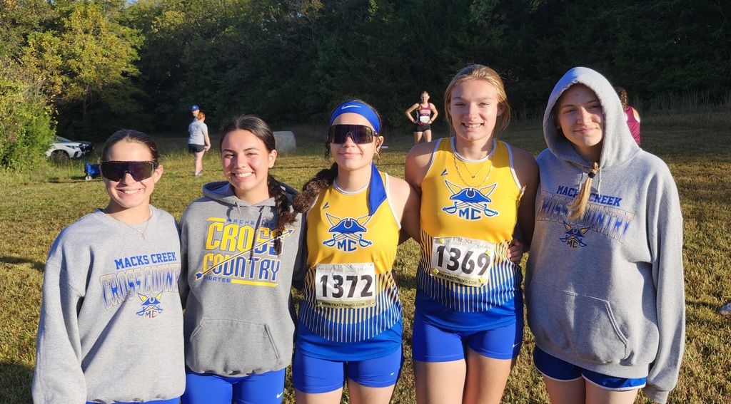 The Lady Pirates XC team paused for a quick photo before starting today's race.