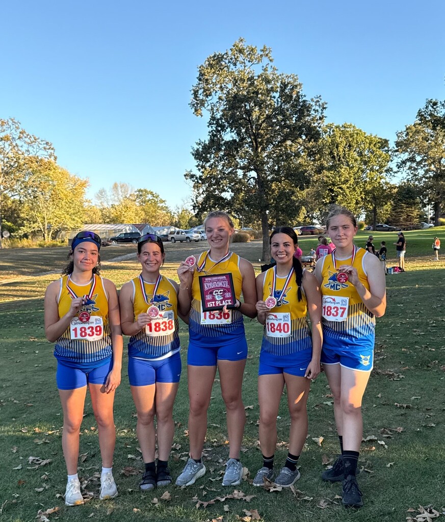 THe Lady Pirates Cross Country team is pictured at Oak Hills Golf course where they raced to win the Dixon Invitational XC Meet.