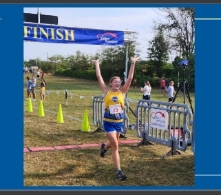 Bailey crossing the finish line last year in the Willard XC Invitational