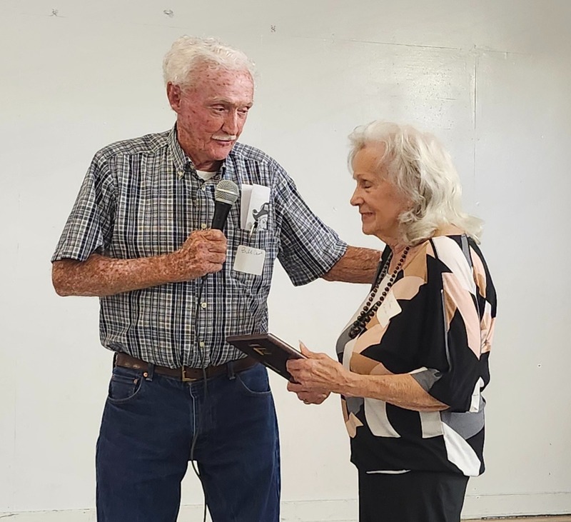 Billy gives Edna her award
