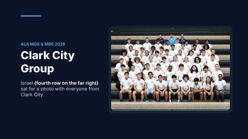 Israel (fourth row on the far right) sat for a photo with everyone from Clark City.
