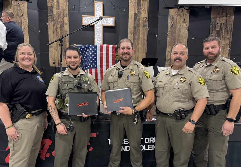 Deputy DeYoe poses with colleagues after the ceremony.